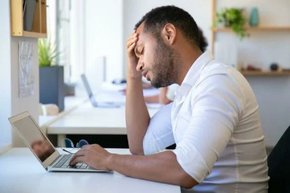 Stressed student preparing for an English test